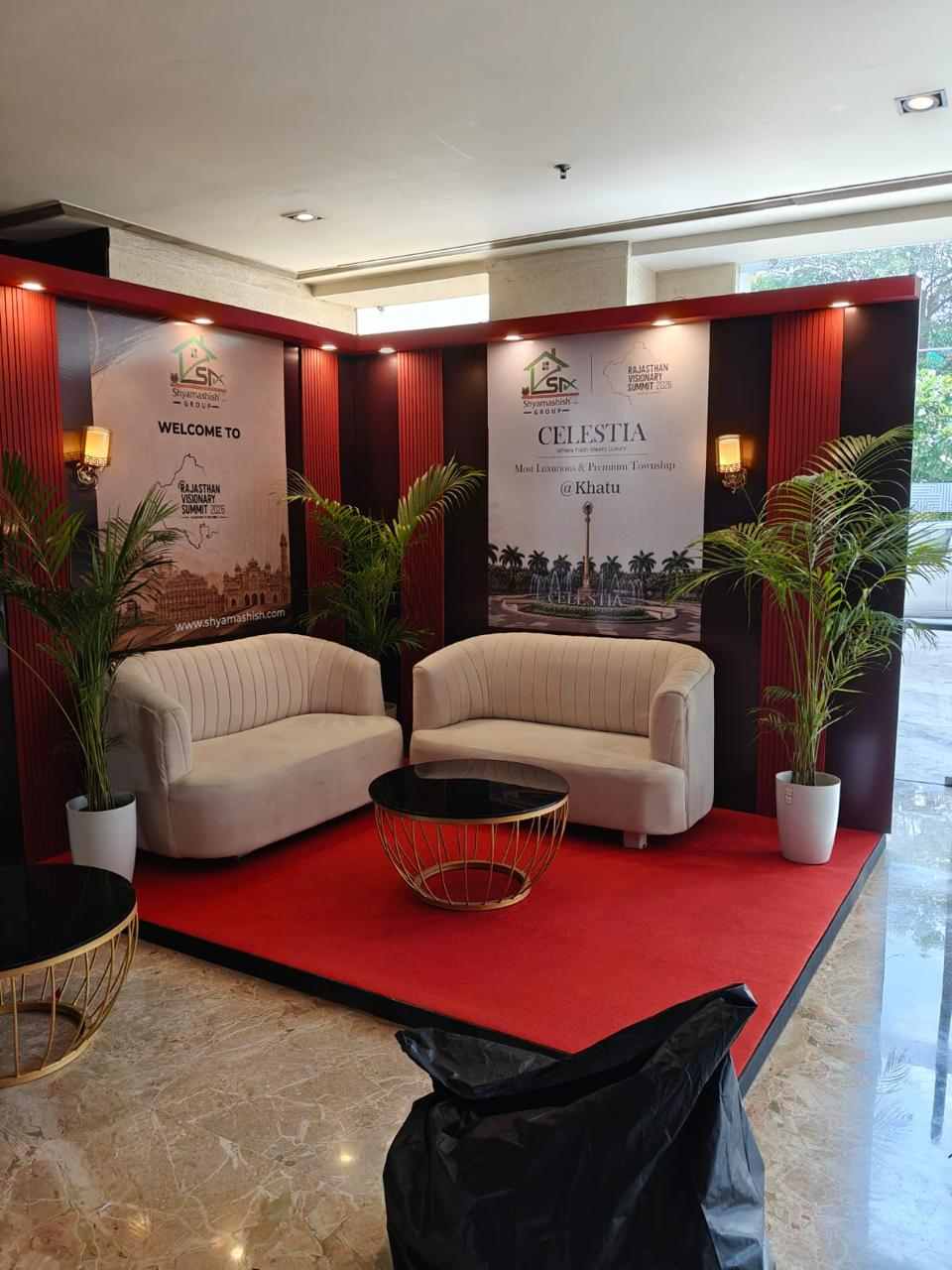 Rajasthan Visionary Summit 2026 - Shyamashish Group welcome lounge and branded set