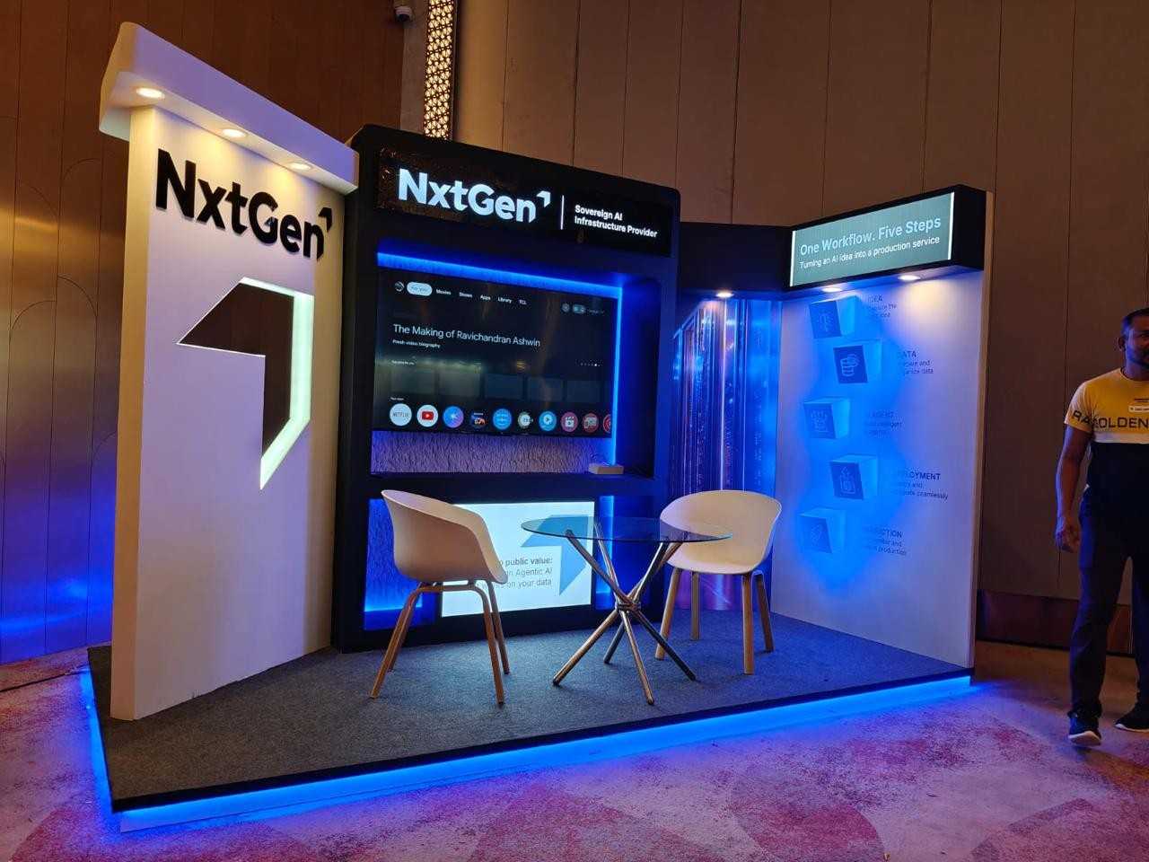 NxtGen exhibition stand - illuminated logo wall and demo screens