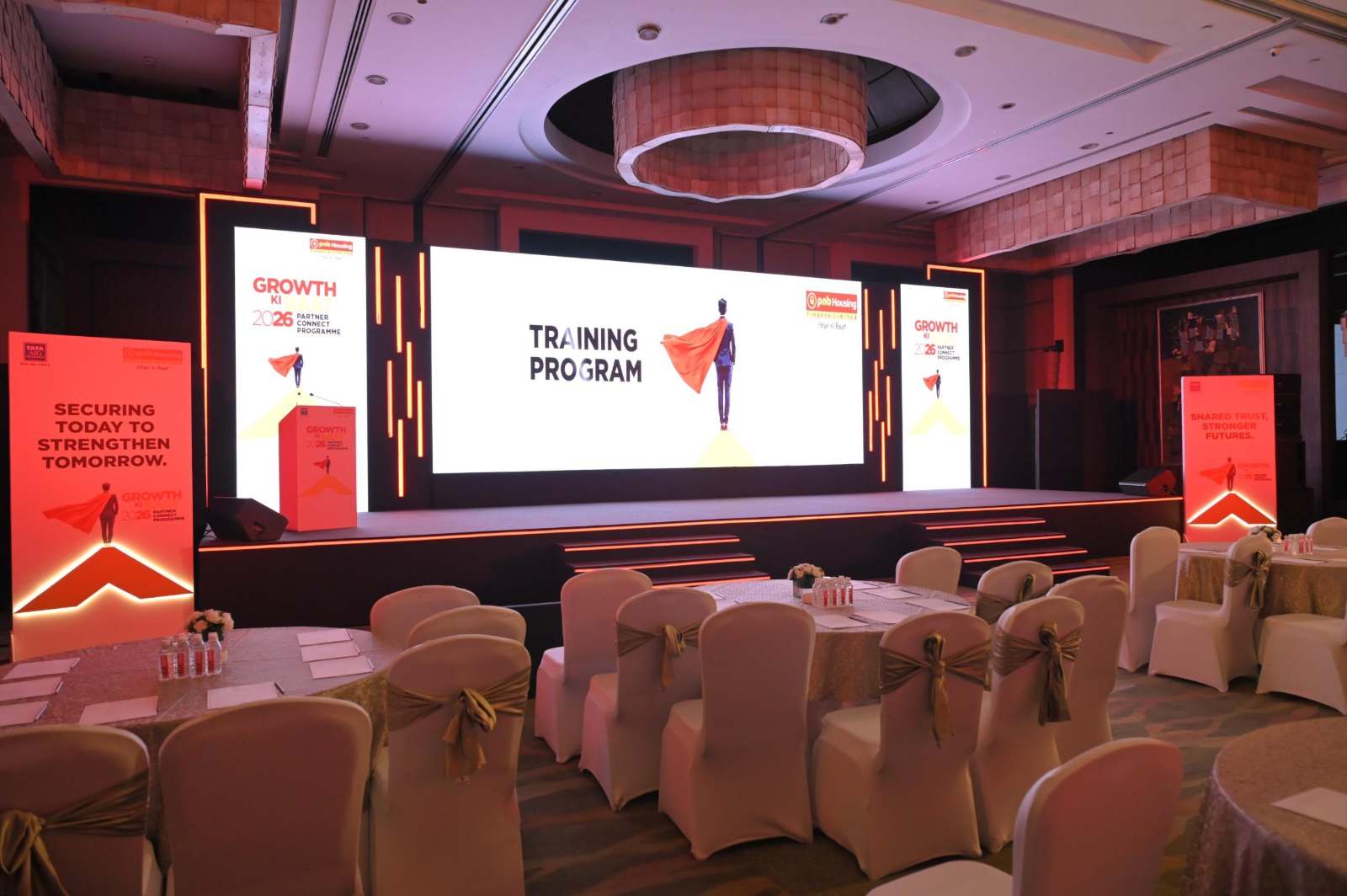 PNB Housing Finance Growth Ki Baat 2026 Partner Connect Programme - LED stage, branded standees and banquet seating